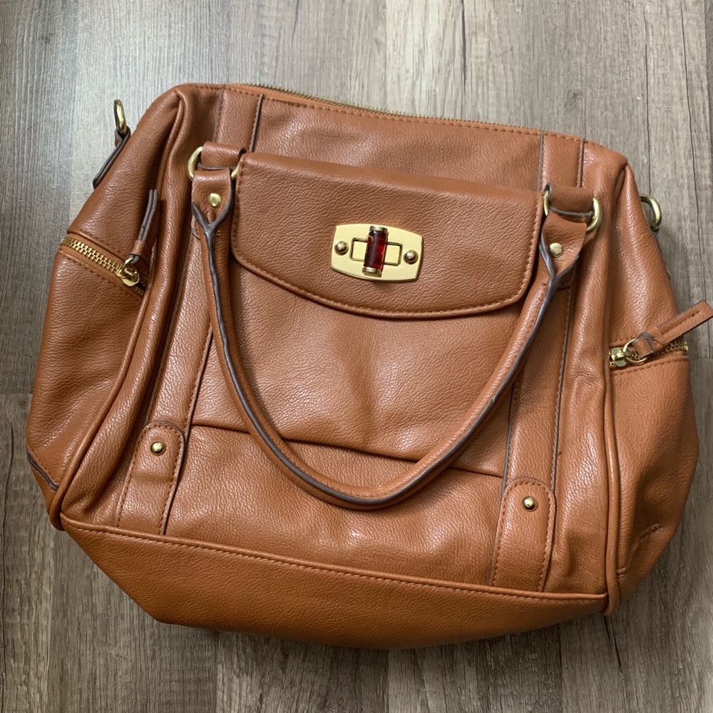 Gently used super light weight and stylish purse